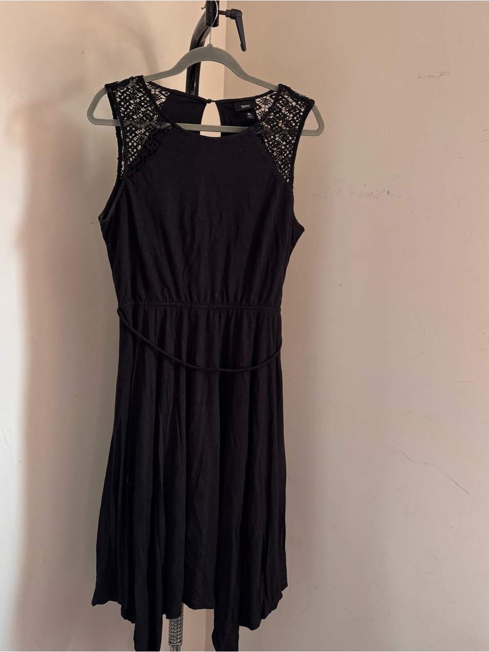 Black dress with crochet detailing on the shoulders